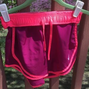 Purple Nike running shorts